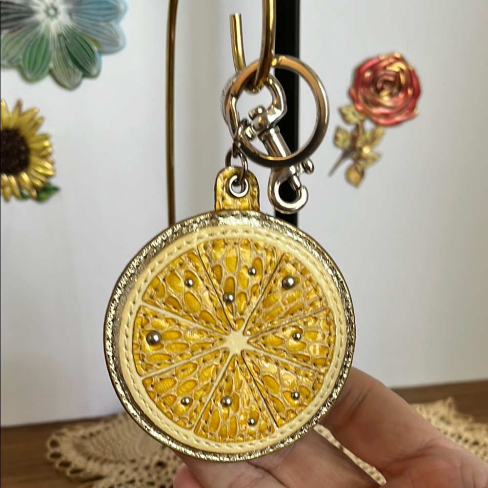 Brighton Gold Citrus Keychain with Silver Spring Clip.
